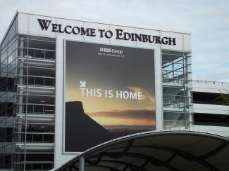 Edinburgh Airport image with RBS welcome poster